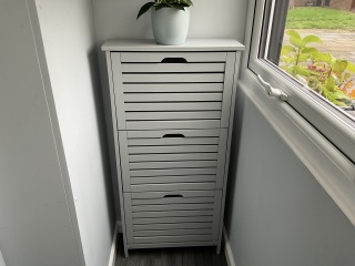 Just an open shoe rack or something closed, for the hall?