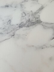 How to cover very small noticeable chip/Mark on worktop? k on