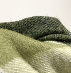 Gifted wool scarf — how to stop fuzzy shedding?