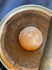 Beans tin black inside, aibu to eat the contents?