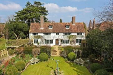 Do people but houses for status?