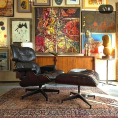 How can I have a cosy but tasteful living room when I have a black leather sofa?