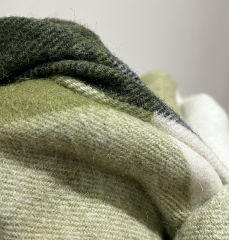 Gifted wool scarf — how to stop fuzzy shedding?