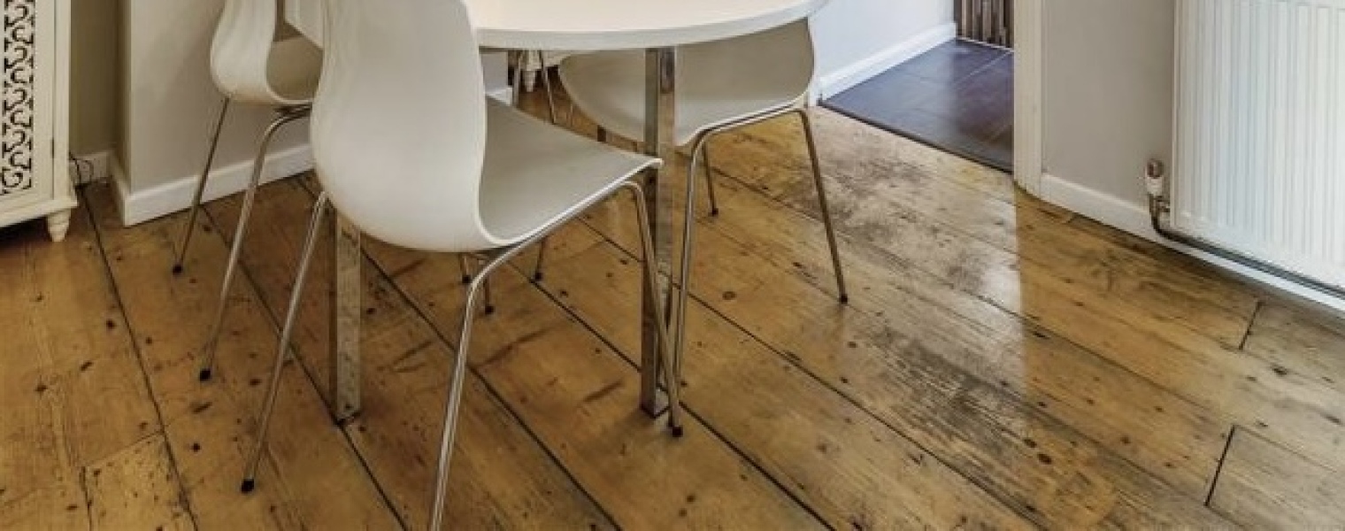 Reclaimed solid wood flooring? Is there an affordable way to get this look?