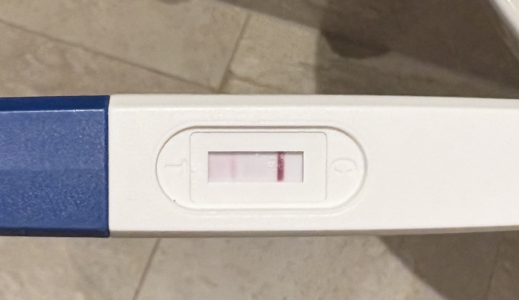12 dpo - BFP but red blood when wiped!?