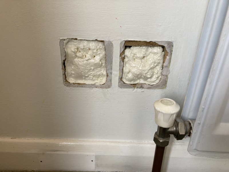 Expanding foam behind radiator