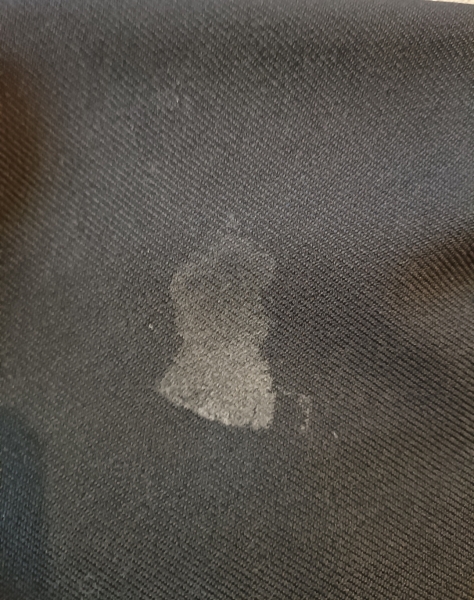 Help with sticky residue on school blazer