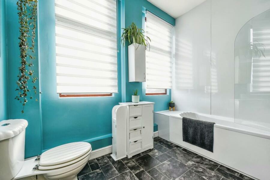 Wall panels vs tiles in bathroom 