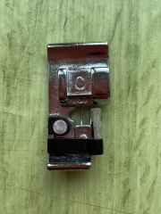 Does anyone have this Janome overedge presser foot?