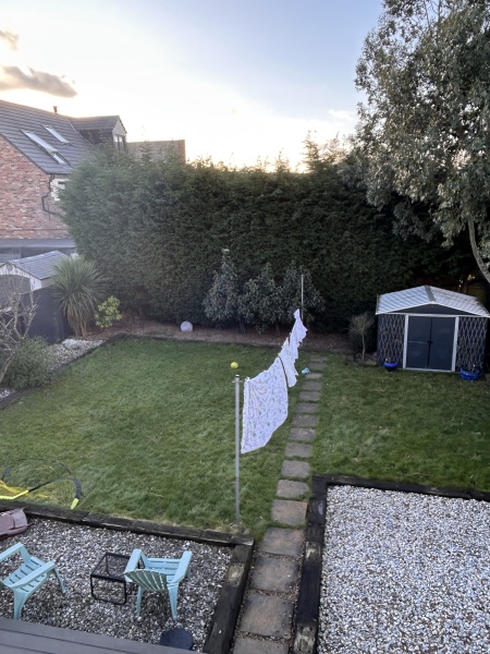 Putting washing on the line in the sun