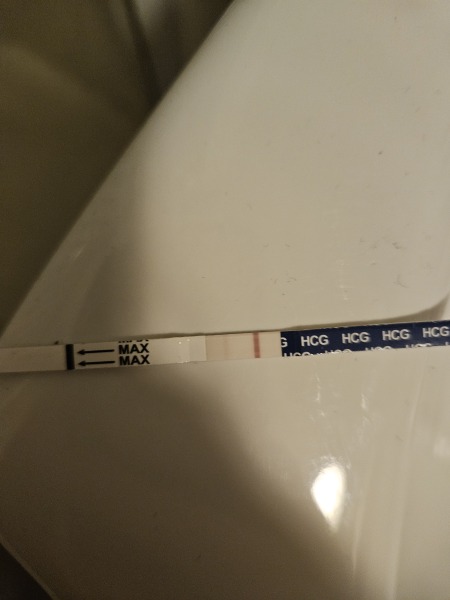 V faint BFP lots of cramps/pains 12dpo