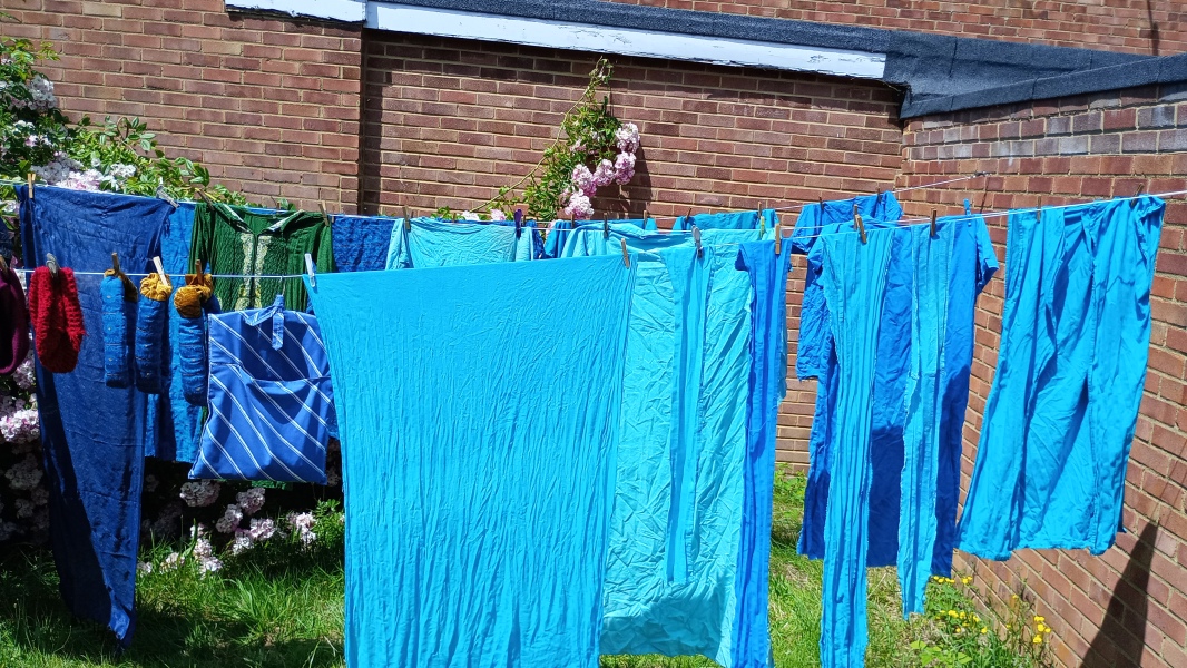 Putting washing on the line in the sun