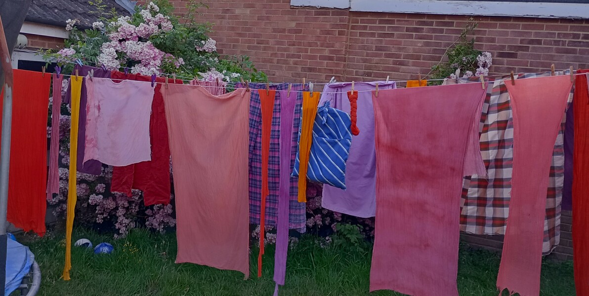 Putting washing on the line in the sun