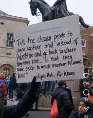 Pro-Palestinian demonstrators chant 'Intifada revolution' and 'UK government watch your back, Palestine is coming back'