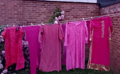 Putting washing on the line in the sun