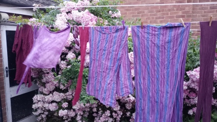 Putting washing on the line in the sun