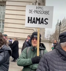 Pro-Palestinian demonstrators chant 'Intifada revolution' and 'UK government watch your back, Palestine is coming back'