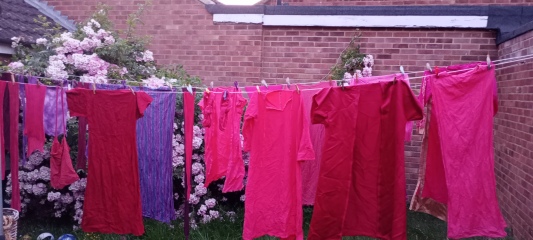 Putting washing on the line in the sun
