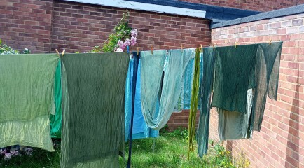 Putting washing on the line in the sun