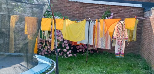 Putting washing on the line in the sun