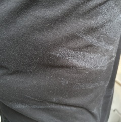 Friction streaks on black T-shirts?