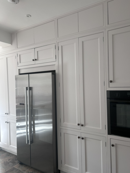 Anyone got tall kitchen cabinets to the ceiling?