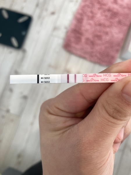 Very pale light pink/brown cervical mucus