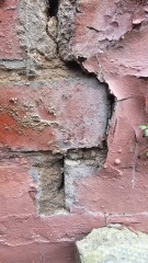 Exposed brick work causing damp