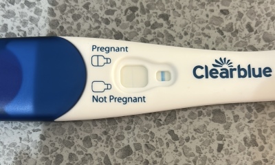 Implantation spotting 4 days ago, faint positive clear blue, negative digital
