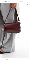 Help me decide which burgundy bag.