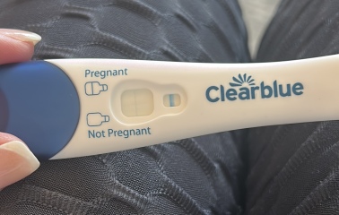 Implantation spotting 4 days ago, faint positive clear blue, negative digital