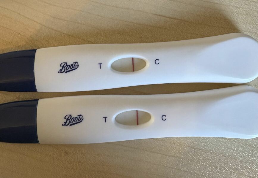 Am I pregnant? Faint line?