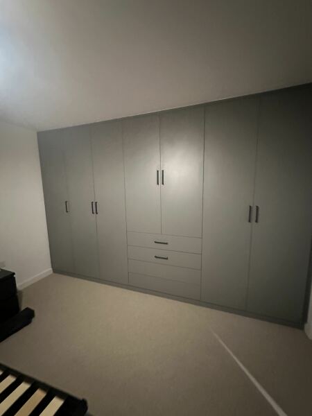 Fitted wardrobes WWYD? Sharps or local carpenter?