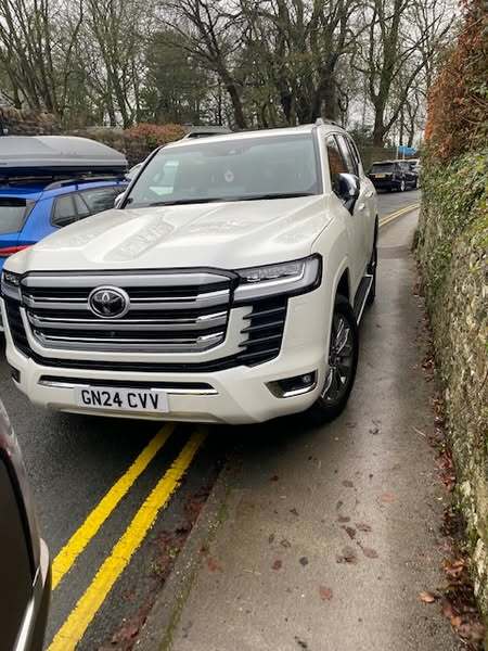 People parking on edge of dropped kerbs