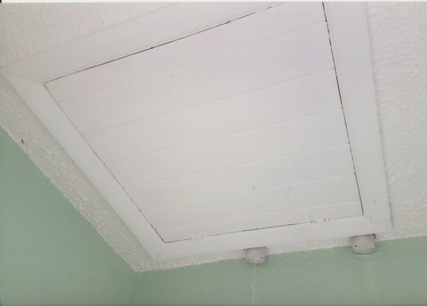 Any way to fix this attic trap door?