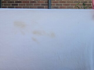 My white tee has yellow marks on front