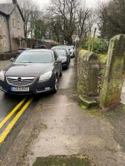 People parking on edge of dropped kerbs