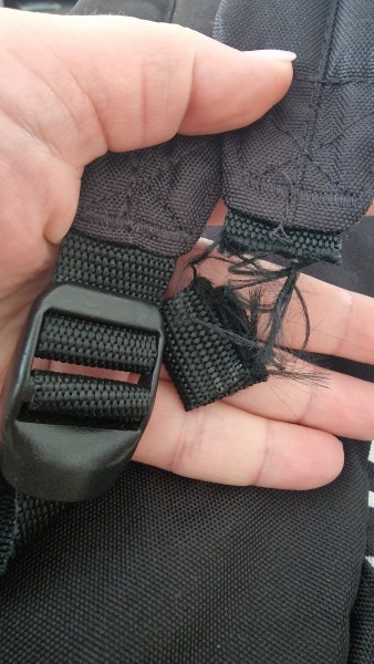 Backpack strap cut with scissors