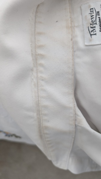 Why does DH's shirt look like this? (Warning: gross pic attached)