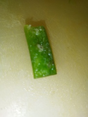 My green bell pepper has a white/brown sugar like substance on the inside, is it ok to eat?