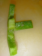 My green bell pepper has a white/brown sugar like substance on the inside, is it ok to eat?