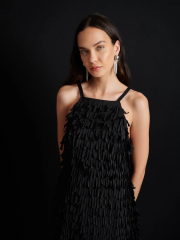 What is the definition of a cocktail dress?