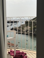 Help! Little fishing village, near to beach, not touristy - help me find the holy grail!