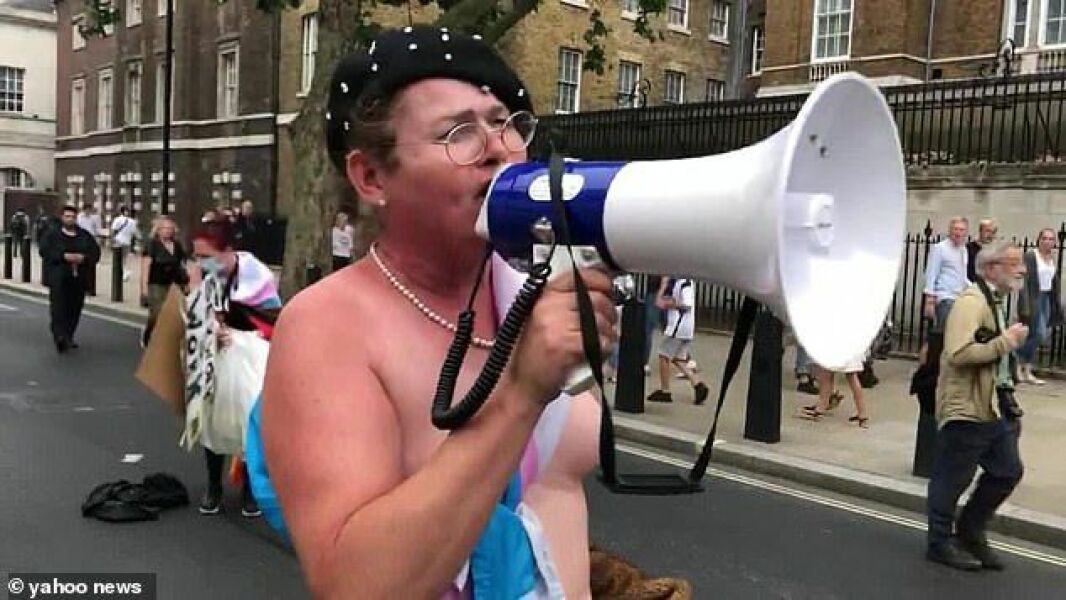Men get their moobs out in protest at the Supreme Court ruling at the Scottish Parliament.