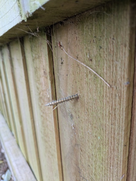 To want to knock nails back through to neighbour's garden