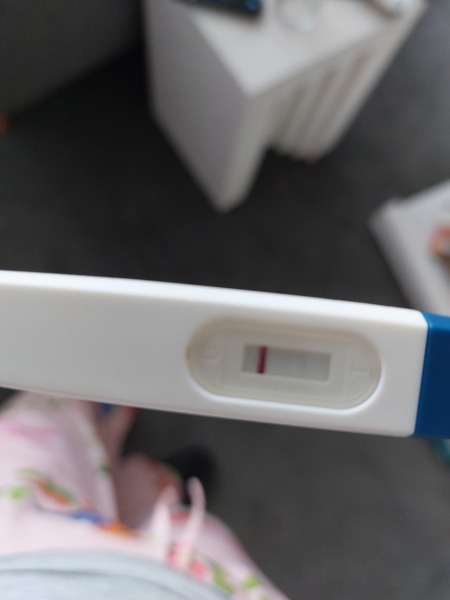Is this a faint positive or evaporation line ?