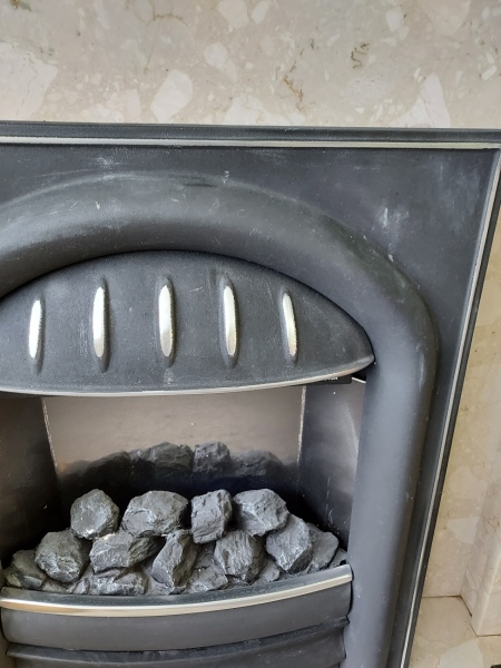 Can't get plaster marks off front of fire