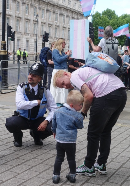 Sarah Jane Baker leads topless protest in London, and threatens named women