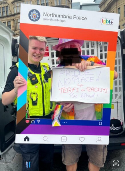 Sarah Jane Baker leads topless protest in London, and threatens named women