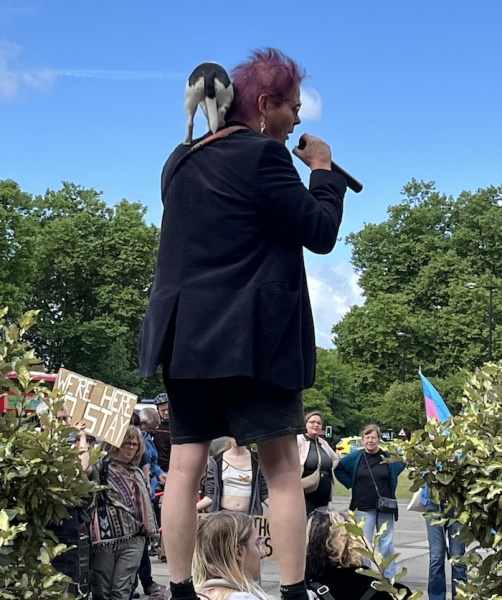 Sarah Jane Baker leads topless protest in London, and threatens named women
